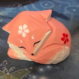 Small wooden carved pink Japanese sakura fox